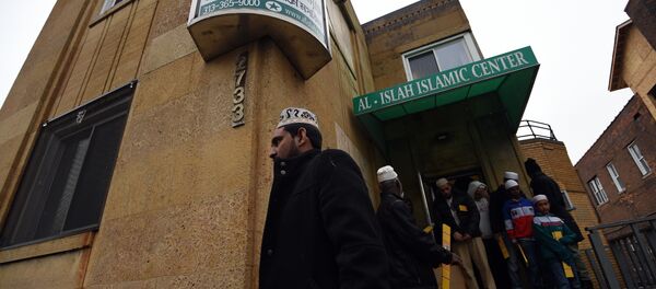 Muslims leave after participating in their weekly Friday noon special prayer at the Al-Islah Islamic Center Mosque in Hamtramck, Michigan, on January 8, 2016 - Sputnik International