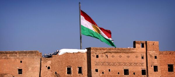 A picture taken on February 3, 2016, shows the Kurdish flag flying over the Arbil Citadel, in the capital of the autonomous Kurdish region of northern Iraq A picture taken on February 3, 2016, shows the Kurdish flag flying over the Arbil Citadel, in the capital of the autonomous Kurdish region of northern Iraq - Sputnik International