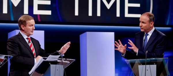 Irish Prime Minister and Fine Gael leader Enda Kenny (L) and Fianna Fail party leader Micheal Martin participate in the final televised leaders' debate in Dublin on February 23, 2016, - Sputnik International