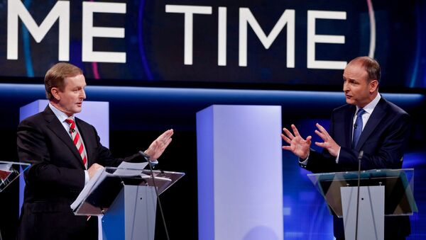 Irish Prime Minister and Fine Gael leader Enda Kenny (L) and Fianna Fail party leader Micheal Martin participate in the final televised leaders' debate in Dublin on February 23, 2016, - Sputnik International