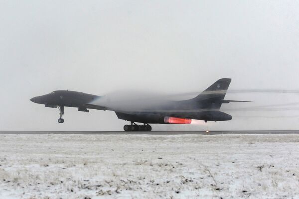 A B-1B Lancer strategic bomber takes off from Ellsworth Air Force Base, in support of Operation Odyssey Dawn in Libya, in this U.S. Air Force file handout photo dated March 27, 2011 - Sputnik International
