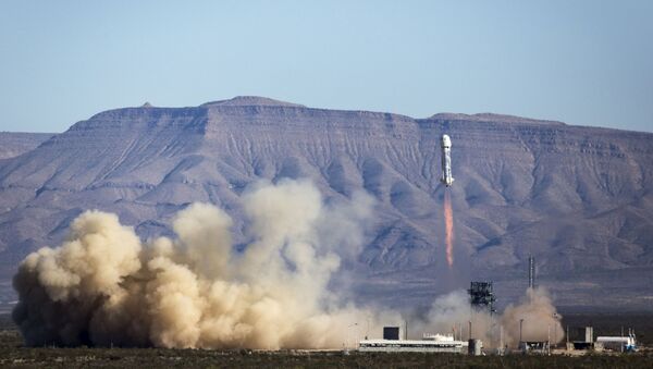The New Shepard rocket and capsule blasts off in this handout photo provided by Blue Origin, from a launch site in West Texas April 2, 2016. - Sputnik International