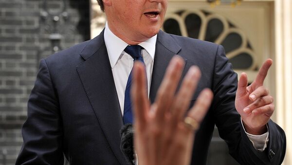 Britain's Prime Minister David Cameron addresses the media outside 10 Downing Street in London. - Sputnik International