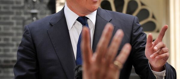 Britain's Prime Minister David Cameron addresses the media outside 10 Downing Street in London. - Sputnik International