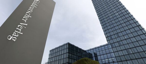 A logo of German publisher Sueddeutsche Verlag of German daily Sueddeutsche Zeitung is pictured in front of the main building in Munich, southern Germany, on April 5, 2016 - Sputnik International