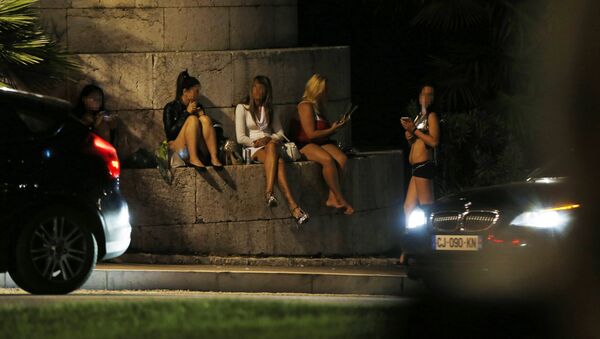 Prostitutes wait for clients in a street of the French southeastern city of Nice. file photo - Sputnik International
