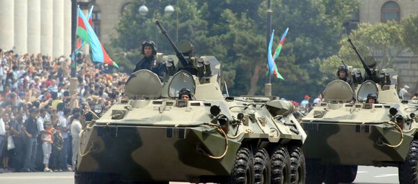 Azeri armoured personnel carriers drive through the center of Baku as part of a military parade in honor of Armed Forces Day on June 26, 2008 - Sputnik International