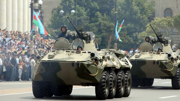 Azeri armoured personnel carriers drive through the center of Baku as part of a military parade in honor of Armed Forces Day on June 26, 2008 - Sputnik International