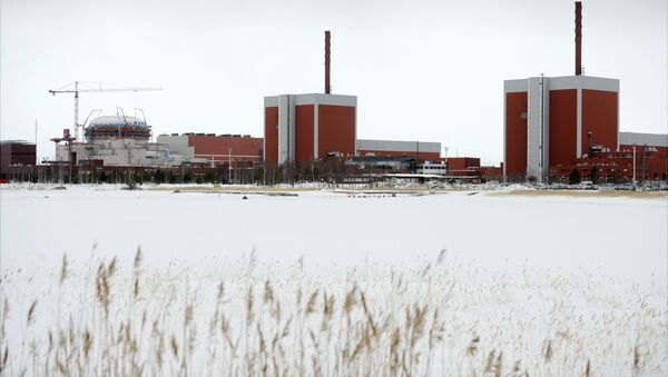 In this March 23, 2011 photo, a general view shows the nuclear power plant Olkiluoto 3 'OL3' under construction next to OL2 and OL1 nuclear reactors in Eurajoki, south-western Finland - Sputnik International
