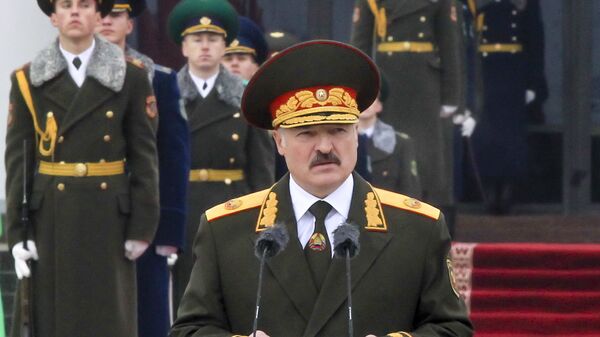 Belarusian President Alexander Lukashenko attends a military parade during his inauguration ceremony in Minsk, Belarus, Friday, Nov. 6, 2015 - Sputnik International