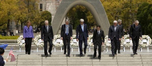 G7 foreign ministers (L to R) EU High Representative for Foreign Affairs Federica Mogherini, Canada's Foreign Minister Stephane Dion, Britain's Foreign Minister Philip Hammond, US Secretary of State John Kerry, Japan's Foreign Minister Fumio Kishida, Germany's Foreign Minister Frank-Walter Steinmeier, Italy's Foreign Minister Paolo Gentiloni and France's Foreign Minister Jean-Marc Ayrault walk together after placing wreaths at the cenotaph at Hiroshima Peace Memorial Park and Museum in Hiroshima, Japan April 11, 2016. G7 foreign ministers (L to R) EU High Representative for Foreign Affairs Federica Mogherini, Canada's Foreign Minister Stephane Dion, Britain's Foreign Minister Philip Hammond, US Secretary of State John Kerry, Japan's Foreign Minister Fumio Kishida, Germany's Foreign Minister Frank-Walter Steinmeier, Italy's Foreign Minister Paolo Gentiloni and France's Foreign Minister Jean-Marc Ayrault walk together after placing wreaths at the cenotaph at Hiroshima Peace Memorial Park and Museum in Hiroshima, Japan April 11, 2016. - Sputnik International