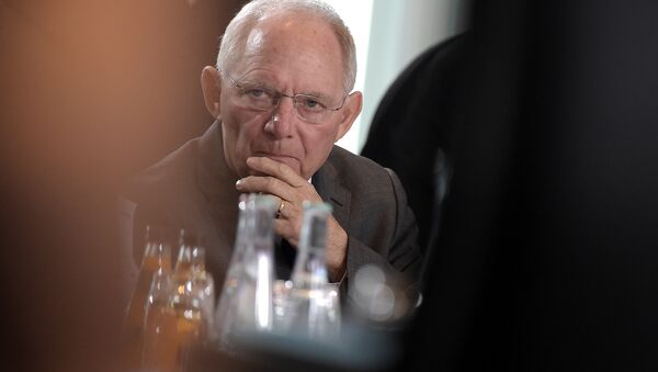 German Finance Minister Wolfgang Schaeuble attends for the weekly cabinet meeting on March 23, 2016 at the Chancellery in Berlin. - Sputnik International