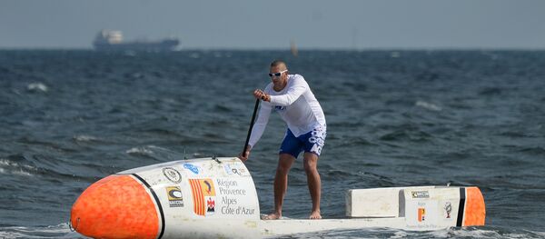 Nicolas Jarossay practicing on his Stand Up Paddel (SUP) off Martigues, as part of a training session ahead of his attempt to cross the Atlantic ocean in his specially designed SUP. (File) Nicolas Jarossay practicing on his Stand Up Paddel (SUP) off Martigues, as part of a training session ahead of his attempt to cross the Atlantic ocean in his specially designed SUP. (File) - Sputnik International