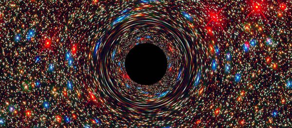 The immense black hole at the center of the galaxy NGC 1600 appears to be 17 billion times the mass of the sun. This computer-simulated view shows a supermassive black hole at a galaxy's core. - Sputnik International