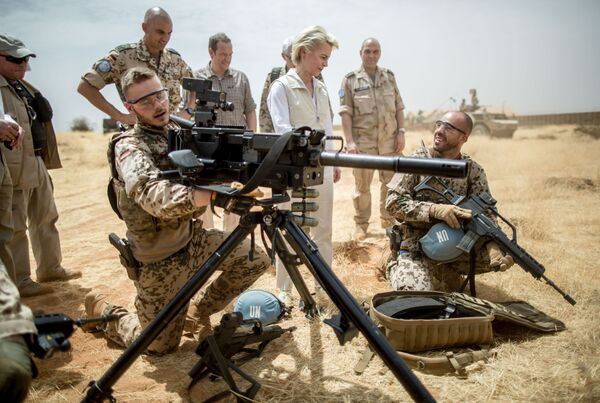 German defense minister Ursula von der Leyen , center speaks with German soldiers at Camp Castor near Gao, Mali German defense minister Ursula von der Leyen , center speaks with German soldiers at Camp Castor near Gao, Mali - Sputnik International