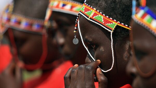 Kenyan teenage Maasai girls attend an alternative right of passage at Kilgoris, Trans Mara district, 220 kilometres north-west of the capital Nairobi, on April 19, 2008 at a ceremony organised by an anti-female genital mutilation, (FGM) campaign, Cherish Others Organisation. - Sputnik International