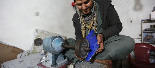 In this Monday, March 28, 2016 photo, an Afghan man works at a lapis lazuli factory in the city of Kabul, Afghanistan. In this Monday, March 28, 2016 photo, an Afghan man works at a lapis lazuli factory in the city of Kabul, Afghanistan. - Sputnik International