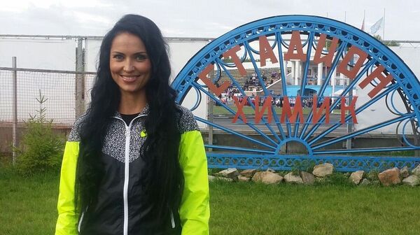 Zhanna Sindyankina stands near a stadium in Kopeysk Zhanna Sindyankina stands near a stadium in Kopeysk - Sputnik International
