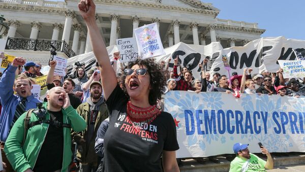 Alejandra Pablos of Arizona leads a chant as voting rights reform demonstrators stage a sit-in at the Capitol in Washington. - Sputnik International