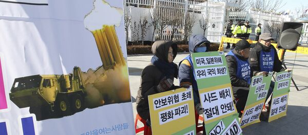 South Korean protesters stage a rally to oppose the possible deployment of the United States' advanced defense system THAAD, a Terminal High-Altitude Area Defense, on Korea Peninsula, in front of the government complex in Seoul, South Korea (File) South Korean protesters stage a rally to oppose the possible deployment of the United States' advanced defense system THAAD, a Terminal High-Altitude Area Defense, on Korea Peninsula, in front of the government complex in Seoul, South Korea (File) - Sputnik International