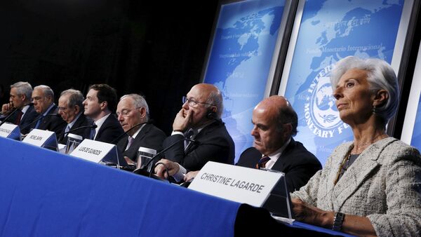 Gurria, Padoan, Osborne, Schaeuble, Sapin, Guindos and Lagarde hold a news conference at the IMF/World Bank Spring Meetings in Washington - Sputnik International