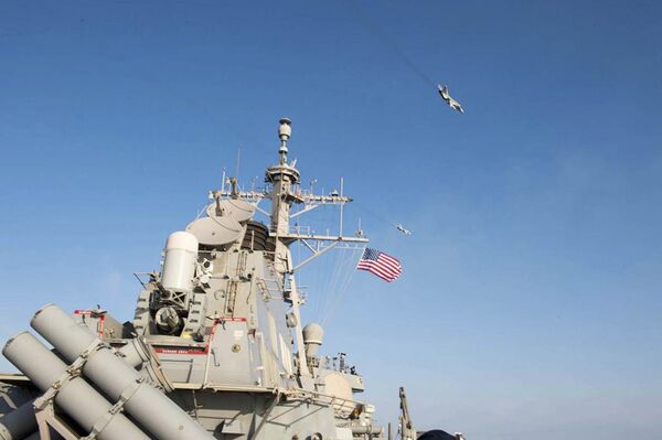 An U.S. Navy picture shows what appears to be a Russian Sukhoi SU-24 attack aircraft flying over the U.S. guided missile destroyer USS Donald Cook in the Baltic Sea in this picture taken April 12, 2016 and released April 13, 2016 An U.S. Navy picture shows what appears to be a Russian Sukhoi SU-24 attack aircraft flying over the U.S. guided missile destroyer USS Donald Cook in the Baltic Sea in this picture taken April 12, 2016 and released April 13, 2016 - Sputnik International