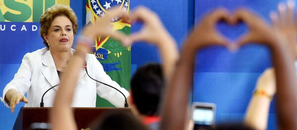 Brazilian President Dilma Rousseff gestures during the Education in Defense of Democracy event, at the Planalto Palace in Brasilia, on April 12, 2016 - Sputnik International