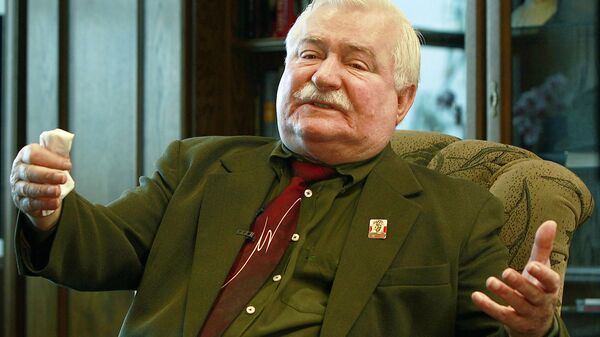 Poland’s former president and legendary Solidarity freedom movement founder Lech Walesa acts with expression as he repeats his denials to allegations he collaborated with the communist regime and talks about the “crisis of democracy” during an exclusive interview with The Associated Press at his new office at the European Solidarity Center in Gdansk, Poland, Wednesday, April 6, 2016 - Sputnik International