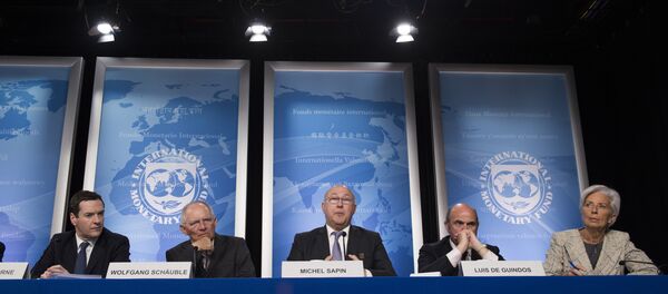 French Finance Minister Michel Sapin (C) speaks next to Chancellor of the Exchequer George Osborne (L), German Finance Minister Wolfgang Schauble (2nd L), Spanish Minister of Economy and Competitiveness Luis De Guindos (2nd R) and IMF Managing Director Christine Lagarde (R) during a press conference - Sputnik International