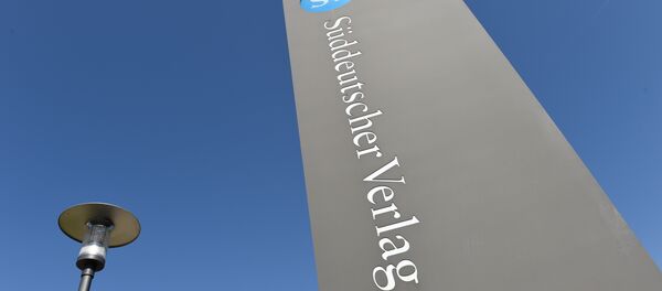 A logo of German publisher Sueddeutsche Verlag of German daily Sueddeutsche Zeitung is pictured in front of the main building in Munich, southern Germany, on April 5, 2016 A logo of German publisher Sueddeutsche Verlag of German daily Sueddeutsche Zeitung is pictured in front of the main building in Munich, southern Germany, on April 5, 2016 - Sputnik International