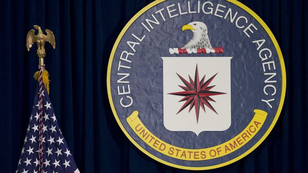 The CIA seal is seen displayed before President Barack Obama speaks at the CIA Headquarters in Langley, Va., Wednesday, April 13, 2016 - Sputnik International