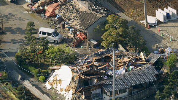 Collapsed houses caused by an earthquake are seen in Mashiki town, Kumamoto prefecture, southern Japan, in this photo taken by Kyodo April 15, 2016 - Sputnik International