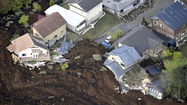 The aftermath of a landslide and destroyed houses caused by an earthquake are seen in Minamiaso town, Kumamoto prefecture, southern Japan, in this photo taken by Kyodo April 16, 2016 - Sputnik International