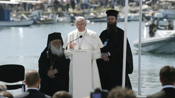 Pope Francis delivers his address at the port of Lesbos during his visits the Greek Island of Lesbos, Greece, April 16, 2016 - Sputnik International