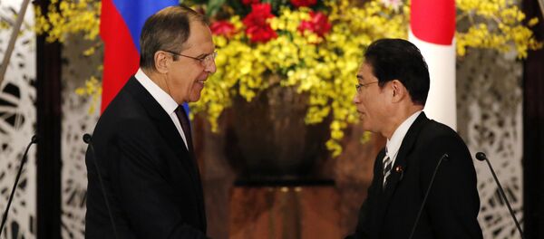 Russia's Foreign Minister Sergey Lavrov, left, shakes hands with his Japanese counterpart Fumio Kishida at the end of their joint news conference after their meeting at the foreign ministry's Iikura guest house in Tokyo, Japan, Friday, April 15, 2016 Russia's Foreign Minister Sergey Lavrov, left, shakes hands with his Japanese counterpart Fumio Kishida at the end of their joint news conference after their meeting at the foreign ministry's Iikura guest house in Tokyo, Japan, Friday, April 15, 2016 - Sputnik International