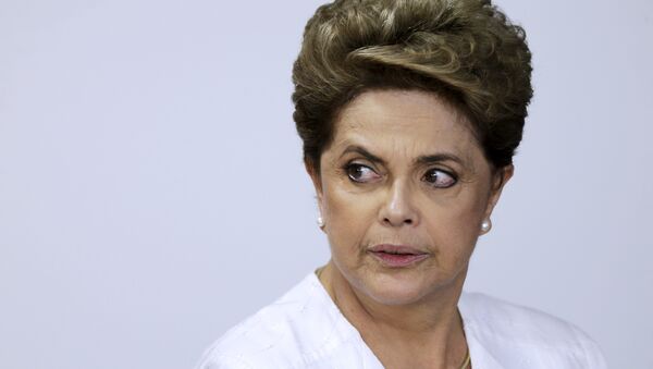 Brazil's President Dilma Rousseff looks on during signing of federal land transfer agreement for the government of the state of Amapa at Planalto Palace in Brasilia, Brazil, April 15, 2016 - Sputnik International