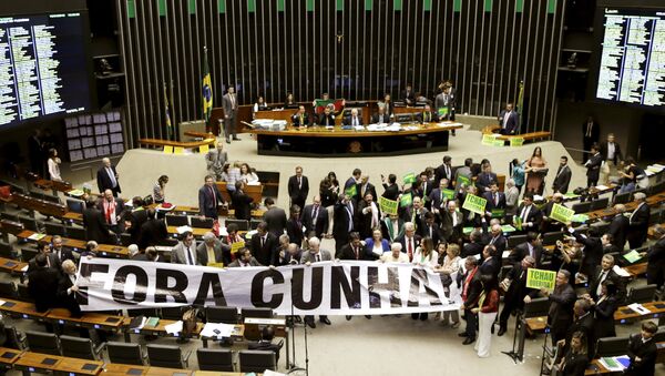 Congressmen demonstrate against President of the Chamber of Deputies Cunha during a session to review the request for Brazilian President Dilma Rousseff's impeachment, at the Chamber of Deputies in Brasilia, Brazil April 16, 2016 - Sputnik International