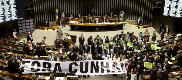 Congressmen demonstrate against President of the Chamber of Deputies Cunha during a session to review the request for Brazilian President Dilma Rousseff's impeachment, at the Chamber of Deputies in Brasilia, Brazil April 16, 2016 - Sputnik International