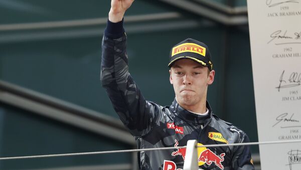 Red Bull Formula One driver Daniil Kvyat of Russia celebrates after the Chinese Grand Prix - Sputnik International