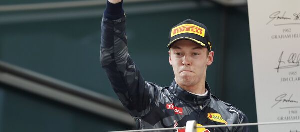 Formula One - Chinese F1 Grand Prix - Shanghai, China - 17/4/16 - Red Bull Formula One driver Daniil Kvyat of Russia celebrates after the Chinese Grand Prix Formula One - Chinese F1 Grand Prix - Shanghai, China - 17/4/16 - Red Bull Formula One driver Daniil Kvyat of Russia celebrates after the Chinese Grand Prix - Sputnik International