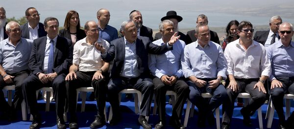 Israeli Prime Minister Benjamin Netanyahu (C front) poses with ministers prior to the weekly cabinet meeting in the Israeli occupied Golan Heights near the ceasefire line between Israel and Syria, April 17, 2016 Israeli Prime Minister Benjamin Netanyahu (C front) poses with ministers prior to the weekly cabinet meeting in the Israeli occupied Golan Heights near the ceasefire line between Israel and Syria, April 17, 2016 - Sputnik International