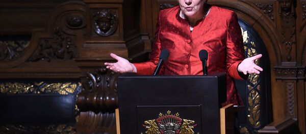 German Chancellor Angela Merkel speaks during the Matthiae Dinner attended by British Prime Minister David Cameron in Hamburg, northern Germany on February 12, 2016. - Sputnik International