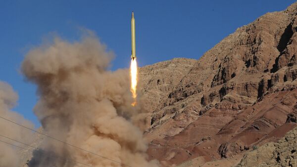 A long-range Qadr ballistic missile is launched in the Alborz mountain range in northern Iran on March 9, 2016. (File) - Sputnik International