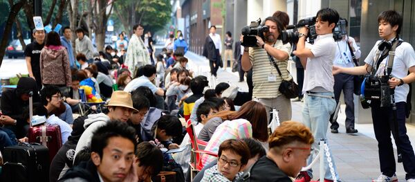 This file photo shows Japanese journalists working on a story This file photo shows Japanese journalists working on a story - Sputnik International