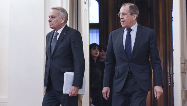 Russian Foreign Minister Sergei Lavrov and French Foreign Minister Jean-Marc Ayrault during a meeting in Moscow - Sputnik International
