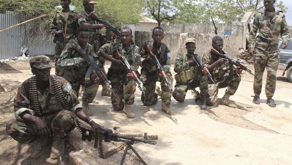 Somali government soldiers pose after they captured Belidogle airport, Somalia. (File) - Sputnik International