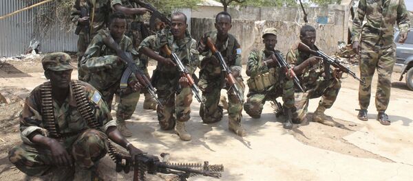 Somali government soldiers pose after they captured Belidogle airport, Somalia. (File) Somali government soldiers pose after they captured Belidogle airport, Somalia. (File) - Sputnik International