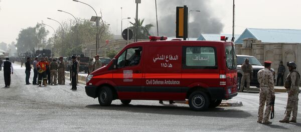 An ambulance arrives at the scene of a bomb attack in Baghdad. File photo - Sputnik International