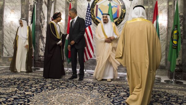 King of Saudi Arabia Salman bin Abdulaziz al-Saud (2nd L) looks on a s US President Barack Obama (3rd L) speaks with Oman Deputy Prime Minister for the Council of Ministers Sayyid Fahd bin Mahmoud al-Said (2nd L) during the family photo for the US-Gulf Cooperation Council Summit in Riyadh, on April 21, 2016 - Sputnik International