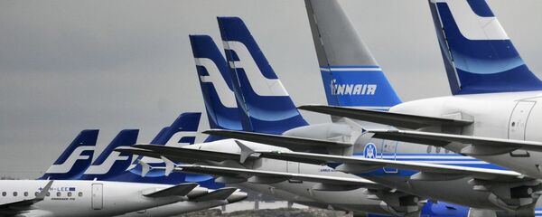 Passenger planes of the Finnish national airline company Finnair stand on the tarmac at Helsinki international airport, Helsinki, Finland - Sputnik International